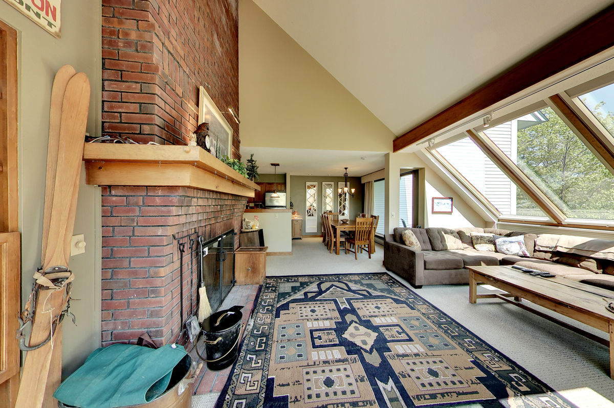 The Living Room with Fireplace of One of Our 4-Bedroom Killington Mountain Rentals.