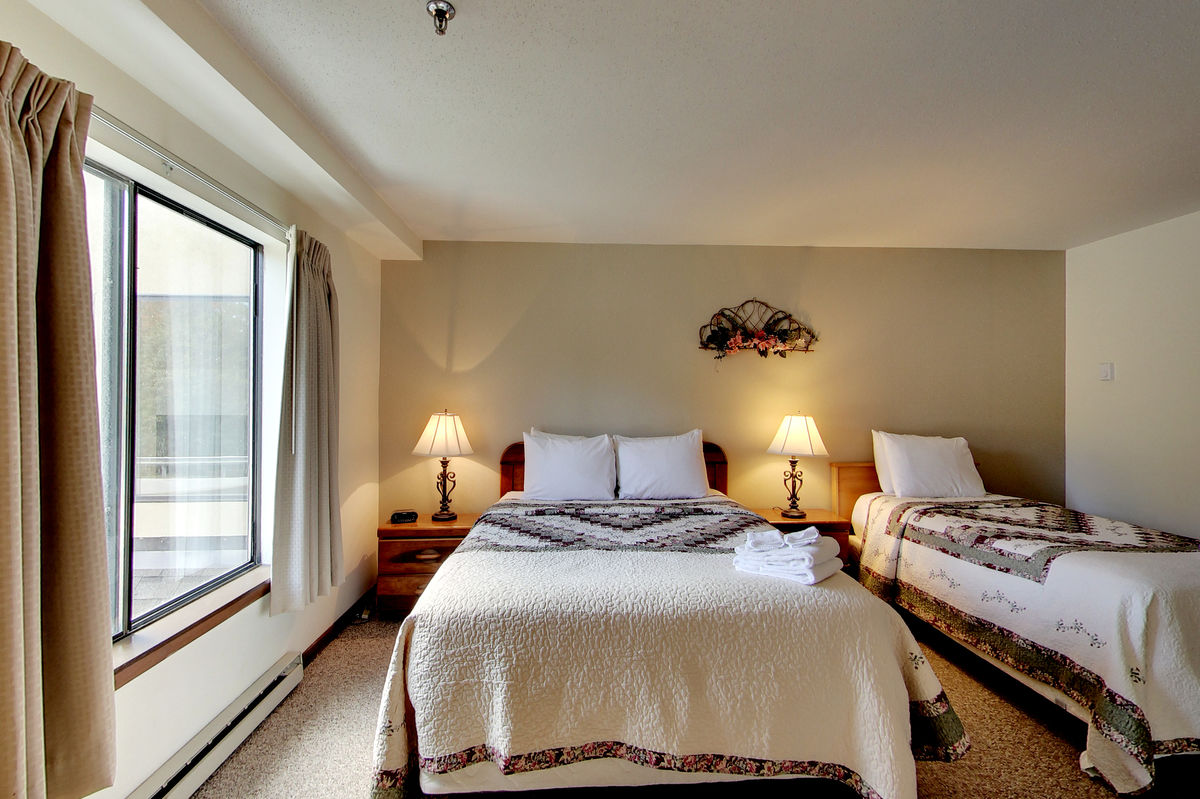Bedroom with Two Beds in one of our Killington Condo Rentals.