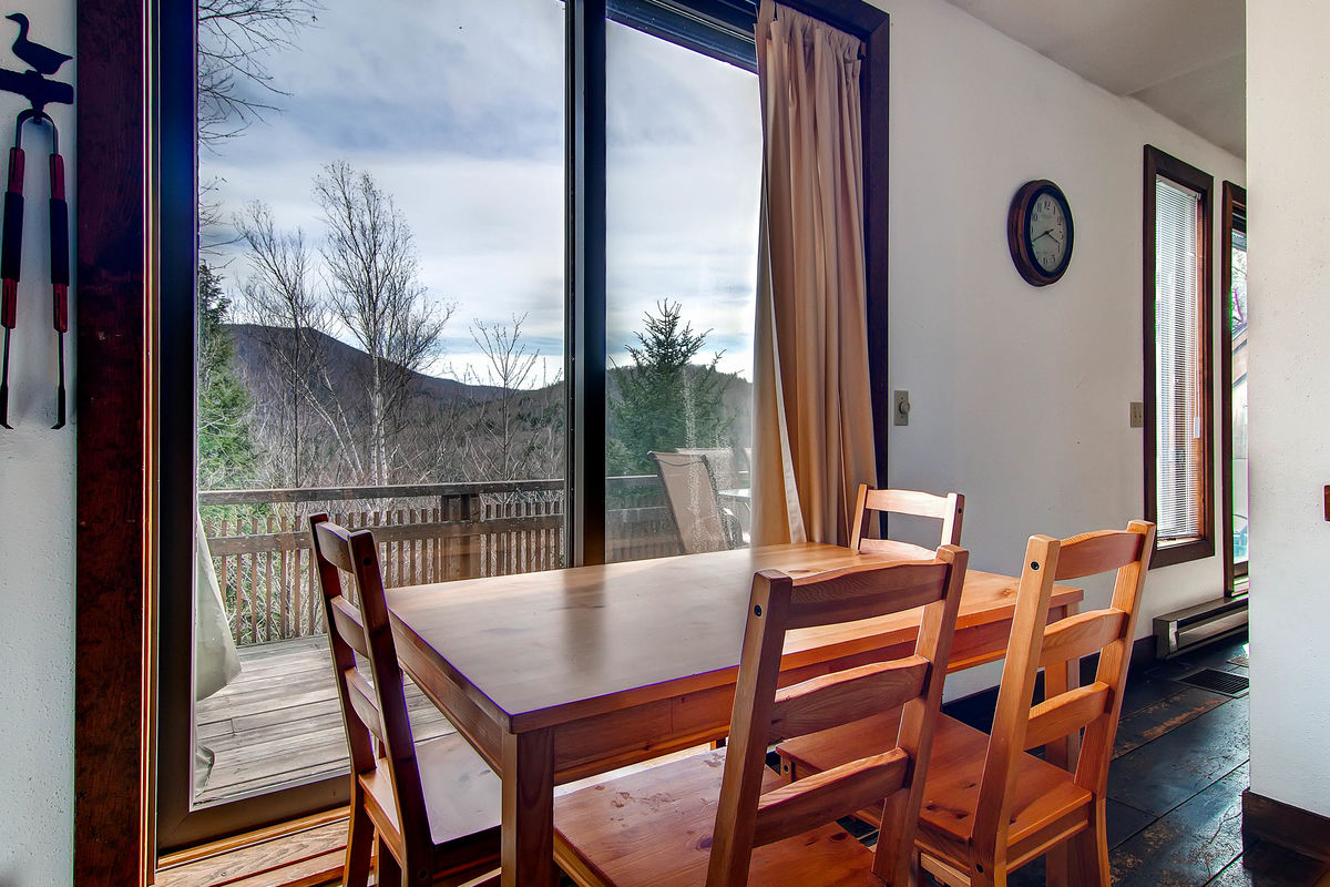 Dining Room with Mountain View in One of our Killington New Year's Eve Rentals.